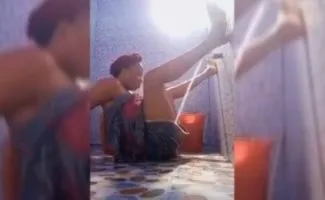 Naughty girl enjoying tap water on her pussy